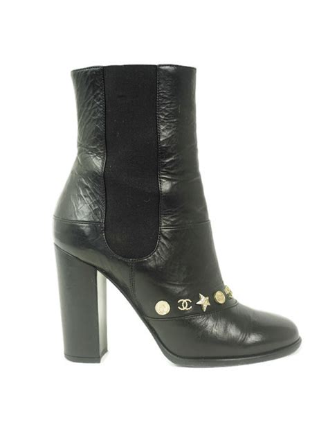 chanel black leather dallas charms short boots|CHANEL.